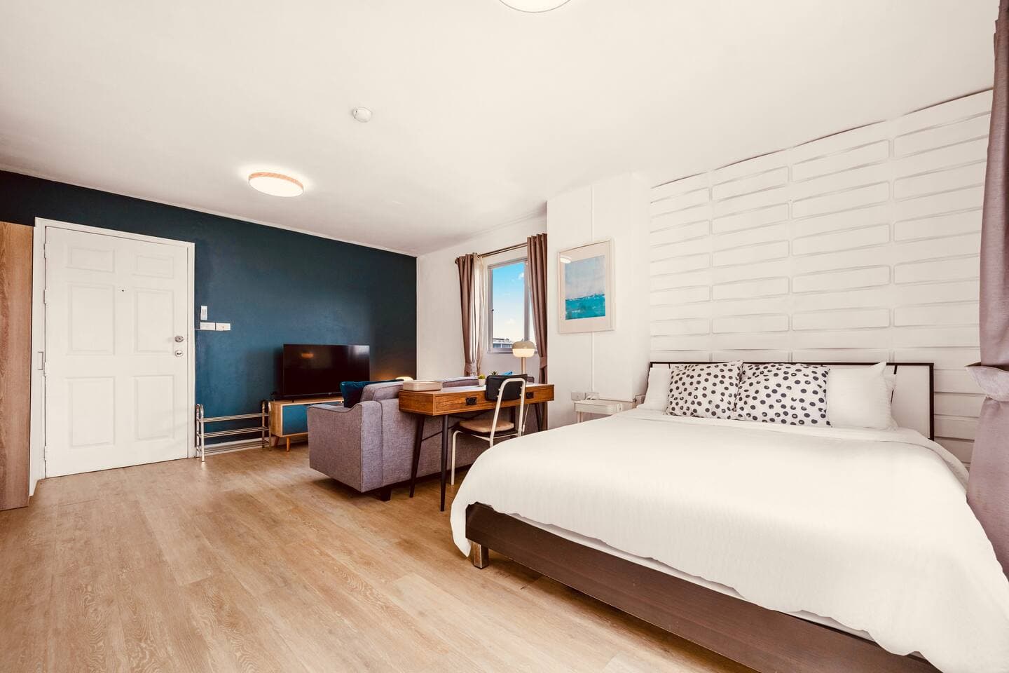 Modern designer interior and clean layout in a quiet riverside condo