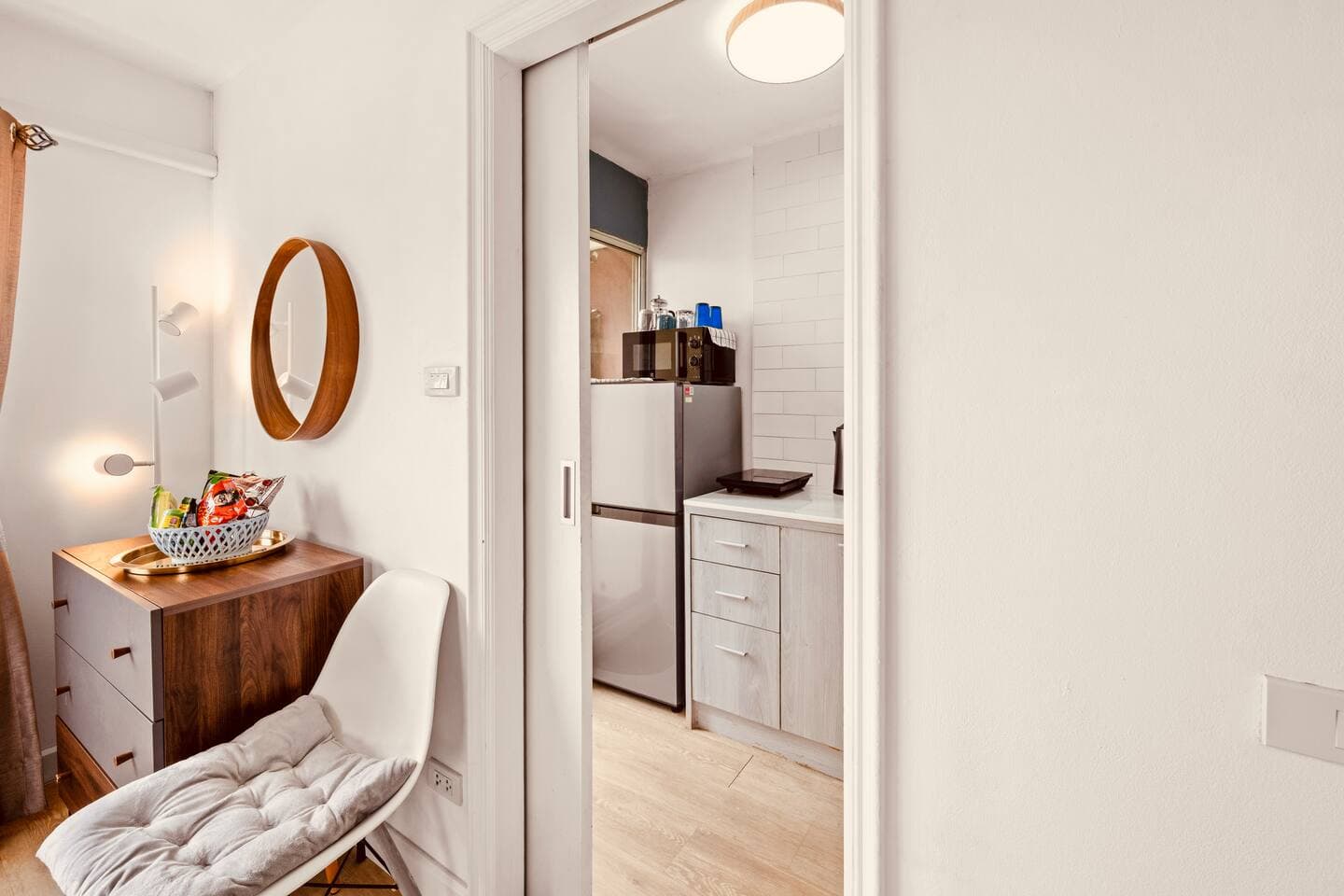 Compact kitchenette equipped with a microwave for convenient city living