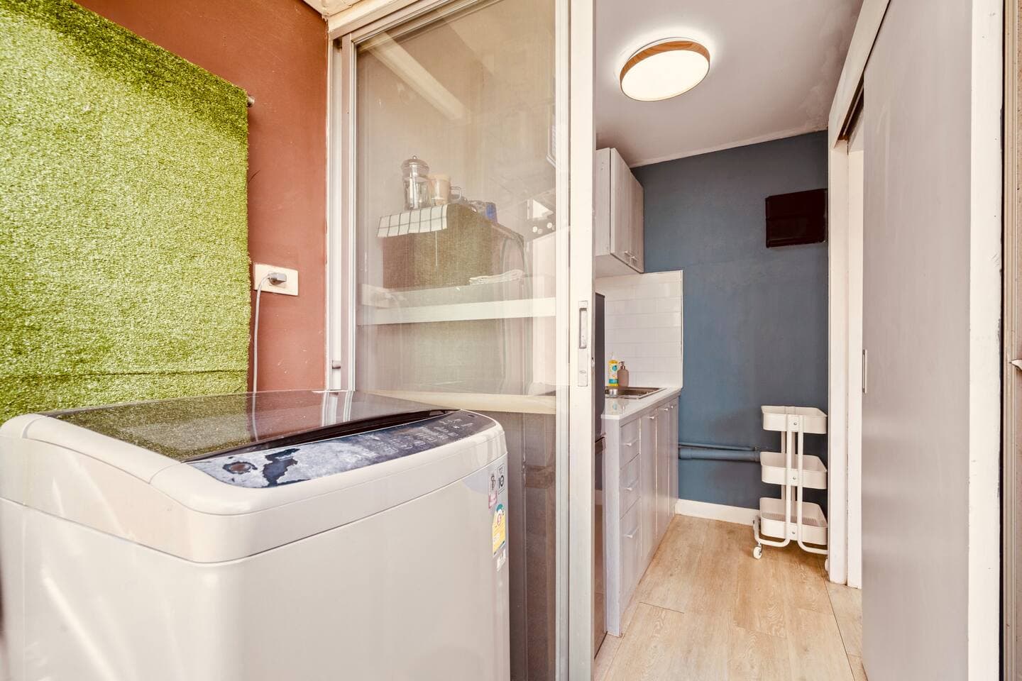 Private in-unit laundry machine located on the balcony