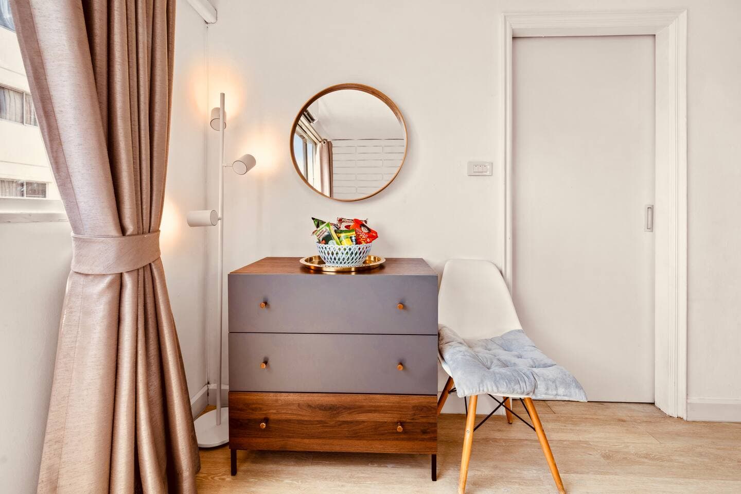 Stylish dresser with vanity mirror and ample closet storage