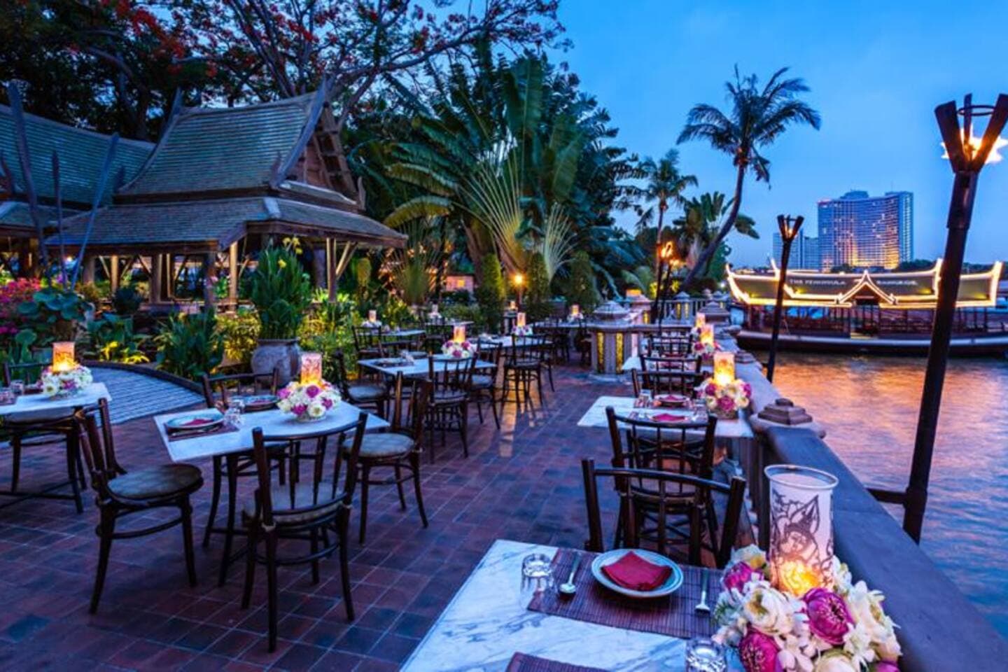 On-site riverside restaurant and dining area near BTS On Nut