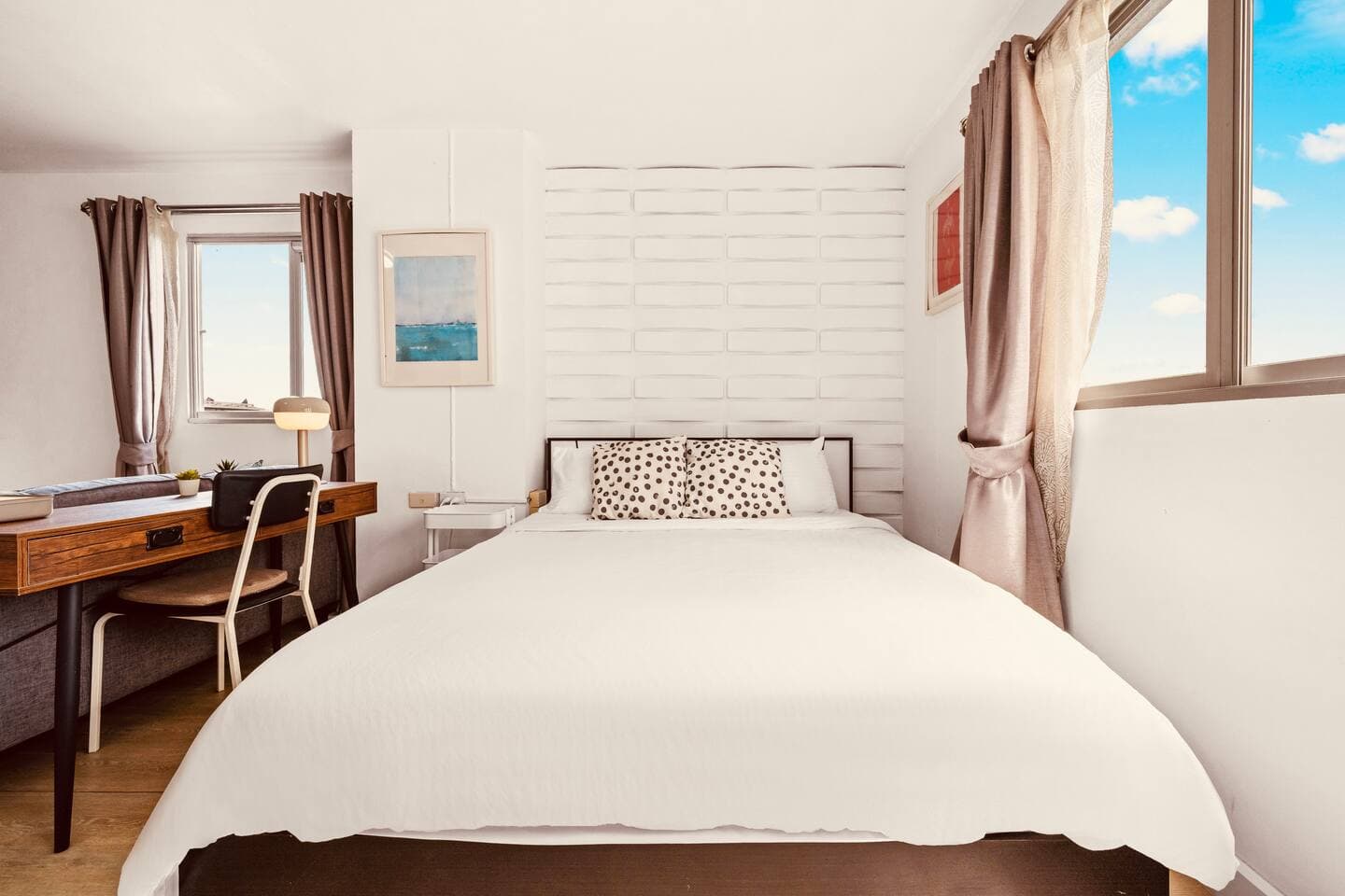 Large king-size bed with premium linens in a peaceful 7th-floor unit