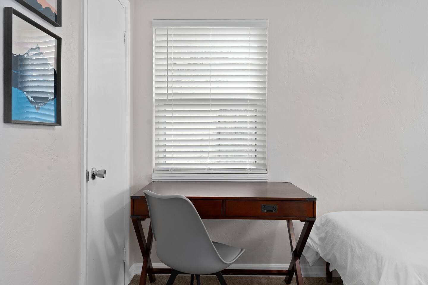 Dedicated workspace with desk and window view – Remote Work Orlando