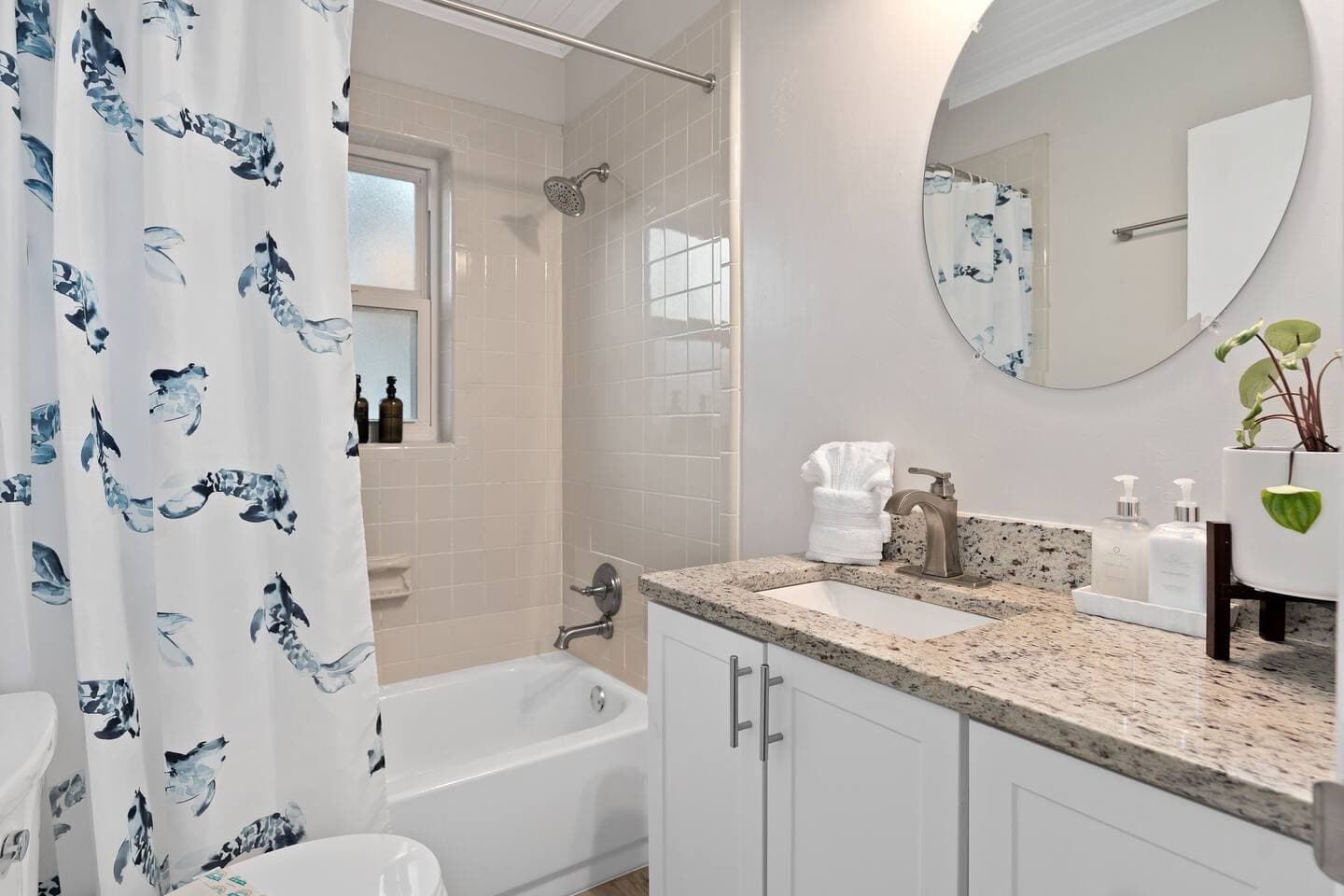 Clean, modern bathroom with luxury toiletries and plush towels